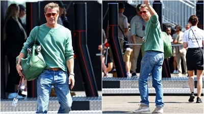 Brad Pitt arrived during the Hungarian Grand Prix at the Hungaroring in Budapest, Hungary, to shoot for his upcoming F1-inspired movie. The actor chose a casual and suave look for the occasion. He chose a green jumper featuring pulled-back full sleeves, a round neckline, and a relaxed fitting. He paired it with acid-washed blue denim jeans, high-top sneakers, a bracelet, rings, a watch, and sunglasses. (Reuters) Brad Pitt arrived during the Hungarian Grand Prix at the Hungaroring in Budapest, Hungary, to shoot for his upcoming F1-inspired movie. The actor chose a casual and suave look for the occasion. He chose a green jumper featuring pulled-back full sleeves, a round neckline, and a relaxed fitting. He paired it with acid-washed blue denim jeans, high-top sneakers, a bracelet, rings, a watch, and sunglasses. (Reuters)