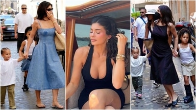 Kylie Jenner is vacationing in Italy with her kids, Aire and Stormi. After wearing a stunning backless bodycon dress during her yacht ride in Venice, Kylie travelled to Rome. She enjoyed two outings with her kids and wore a denim midi dress and a black backless midi dress for both occasions. (Instagram) Kylie Jenner is vacationing in Italy with her kids, Aire and Stormi. After wearing a stunning backless bodycon dress during her yacht ride in Venice, Kylie travelled to Rome. She enjoyed two outings with her kids and wore a denim midi dress and a black backless midi dress for both occasions. (Instagram)
