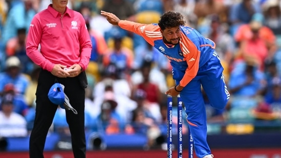 India's Kuldeep Yadav bowls during the ICC men's Twenty20 World Cup 2024 match.(AFP)