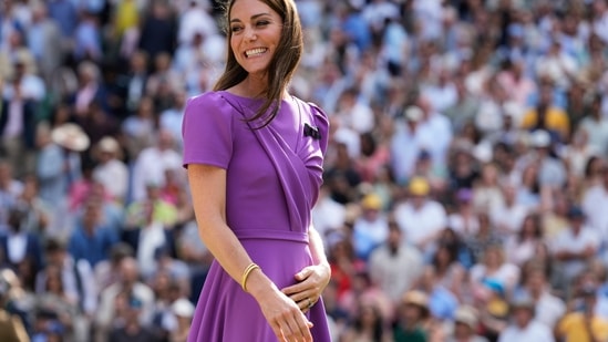 Kate, Princess of Wales, smiles as she waits to present the trophy to Carlos Alcaraz of Spain at the men's singles final at the Wimbledon tennis championships in London, July 14, 2024. (AP Photo/Kirsty Wigglesworth)(AP)