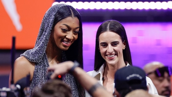 FILE - LSU's Angel Reese, left, and Iowa's Caitlin Clark, right, pose for a photo before the WNBA basketball draft, Monday, April 15, 2024, in New York. Caitlin Clark and Angel Reese will once again step into the spotlight during All-Star Weekend with their matchup against Team USA. (AP / Adam Hunger)