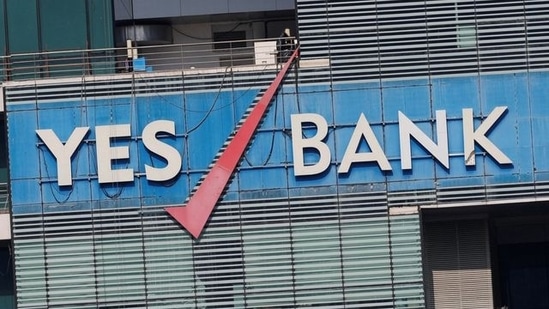 YES Bank Q1 results: The logo of Yes Bank is pictured on the facade of its headquarters in Mumbai.(Reuters)