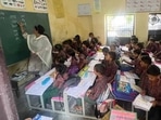Students sitting in a single room at Government Primary Smart School, Kundanpuri (Manish/Hindustan Times)
