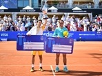 Portugal's Nuno Borges (L) and Spain's Rafael Nadal celebrate after their men's final singles match of the ATP Nordea Open tennis tournament in Bastad, Sweden.