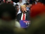 TOPSHOT - Former US President and 2024 presidential nominee Donald Trump speaks during a campaign rally with US Senator and vice presidential nominee J.D. Vance at Van Andel Arena in Grand Rapids, Michigan, on July 20, 2024. (Photo by Jim WATSON / AFP)(AFP)