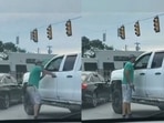 The man in a hat, green shirt and cargo shorts seen approaching the pickup truck was identified as Gavin Dasaur, an Indian-origin man from Agra. The altercation over suspected road rage happened at an intersection on Indianapolis’ southeast side. (Indiana, US). The man in a hat, green shirt and cargo shorts seen approaching the pickup truck was identified as Gavin Dasaur, an Indian-origin man from Agra. The altercation over suspected road rage happened at an intersection on Indianapolis’ southeast side. (Indiana, US).