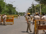 Police personnel at a check post in Sohna. (PTI Photo)