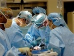 A team of doctors were seen surrounding the woman in the video. A team of doctors were seen surrounding the woman in the video.
