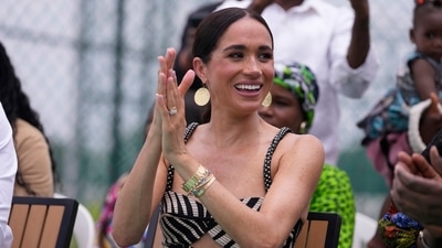 Meghan Markle watches her husband Prince Harry play in an exhibition sitting volleyball match, in Abuja, Nigeria, Saturday, May 11, 2024. Prince Harry and his wife Meghan are in Nigeria to champion the Invictus Games, which he founded to aid the rehabilitation of wounded and sick servicemembers and veterans. (AP) Meghan Markle watches her husband Prince Harry play in an exhibition sitting volleyball match, in Abuja, Nigeria, Saturday, May 11, 2024. Prince Harry and his wife Meghan are in Nigeria to champion the Invictus Games, which he founded to aid the rehabilitation of wounded and sick servicemembers and veterans. (AP)