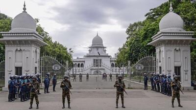 Police stand guard outside Bangladesh's Supreme Court in Dhaka, Bangladesh, Sunday. Bangladesh top court on Sunday scaled back a controversial quota system for government job applicants. (AP) Police stand guard outside Bangladesh's Supreme Court in Dhaka, Bangladesh, Sunday. Bangladesh top court on Sunday scaled back a controversial quota system for government job applicants. (AP)