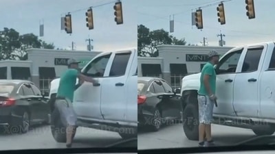 The man in a hat, green shirt and cargo shorts seen approaching the pickup truck was identified as Gavin Dasaur, an Indian-origin man from Agra. The altercation over suspected road rage happened at an intersection on Indianapolis’ southeast side. (Indiana, US). The man in a hat, green shirt and cargo shorts seen approaching the pickup truck was identified as Gavin Dasaur, an Indian-origin man from Agra. The altercation over suspected road rage happened at an intersection on Indianapolis’ southeast side. (Indiana, US).