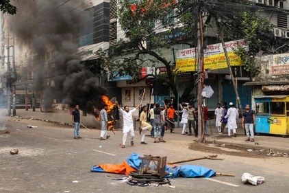 Protesters clash with police during the ongoing anti-quota protest in Dhaka on July 19, 2024. (AFP)