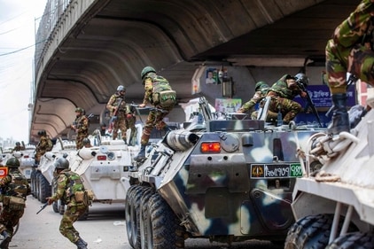 Bangladeshi soldiers disembark armoured vehicles as they patrol the streets to disperse the anti-quota protesters in Dhaka on July 20, 2024. (AFP)