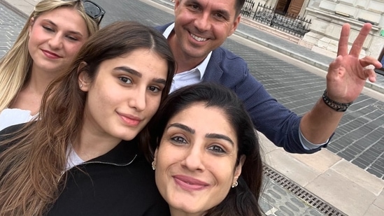 One picture shows the mother-daughter duo posing with close friends.