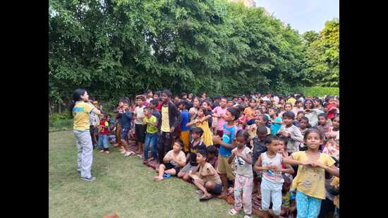 Underprivileged kids at a Saturday infotainment session at the Sharmas’ house. (HT)