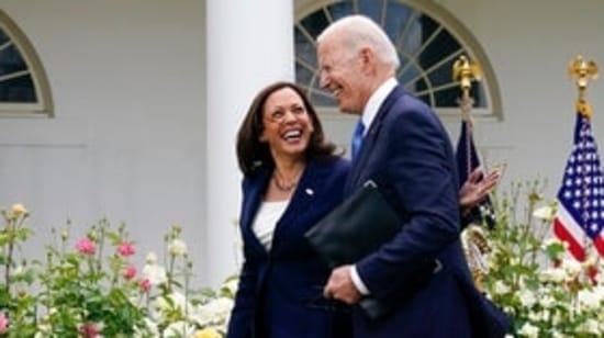 President Joe Biden walks with Vice President Kamala Harris (AP)