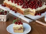 A vanilla sheet cake with buttercream and topped with cherries(Instagram)