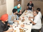 Vicky Kaushal, Ammy Virk savouring kabab-paratha at Tundey Kababi in Lucknow(HT Photo) Vicky Kaushal, Ammy Virk savouring kabab-paratha at Tundey Kababi in Lucknow(HT Photo)