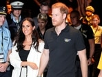 FILE - Britain's Prince Harry, right, and Meghan, Duchess of Sussex, arrive to a wheelchair basketball match at the Invictus Games in Duesseldorf, Germany, Sept. 13, 2023.