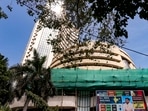 A screen displays stock numbers outside the Bombay Stock Exchange (BSE) building in Mumbai. A screen displays stock numbers outside the Bombay Stock Exchange (BSE) building in Mumbai.