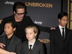 Brad Pitt with Pax (L), Shiloh (C) and Maddox (R) at the premiere of Jolie’s film, Unbroken. (Shutterstock) Brad Pitt with Pax (L), Shiloh (C) and Maddox (R) at the premiere of Jolie’s film, Unbroken. (Shutterstock)