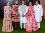 Prime Minister Narendra Modi poses for a photo with Anant Ambani and Radhika Merchant during their Shubh Aashirwad ceremony at Jio World Centre in Mumbai on Saturday. Reliance Foundation Founder and Chairperson Nita Ambani and her husband and Reliance Industries Chairman Mukesh Ambani also seen. (ANI)

