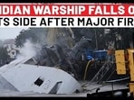 INDIAN WARSHIP FALLS ON
ITS SIDE AFTER MAJOR FIRE