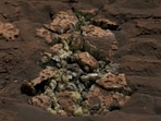 NASA's Curiosity rover found these yellow crystals after driving over rocks. When cracked open, they revealed a surprise inside. Further analysis confirmed that the crystals are elemental sulfur, making it the first time this kind of sulfur has been found on Mars. 