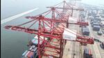Cranes load and unload shipping containers at a port in Lianyungang, in eastern China's Jiangsu province on July 12 (AFP) Cranes load and unload shipping containers at a port in Lianyungang, in eastern China's Jiangsu province on July 12 (AFP)