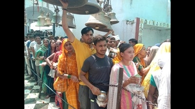 Devotees in queue at Bateshwar Temple in outskirts of Agra on first Monday of Sawan (HT Photo) Devotees in queue at Bateshwar Temple in outskirts of Agra on first Monday of Sawan (HT Photo)