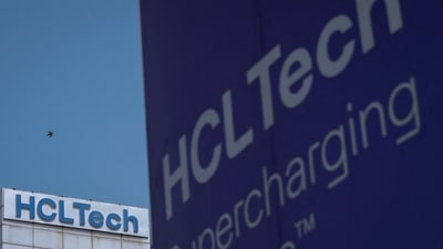 FILE PHOTO: A pigeon flies past a logo of HCL Technologies installed at their headquarters in Noida, on the outskirts of New Delhi, India, August 28, 2023. REUTERS/Adnan Abidi/File Photo (REUTERS)