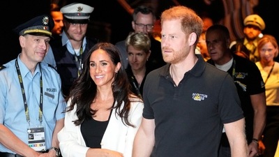 FILE - Britain's Prince Harry, right, and Meghan, Duchess of Sussex, arrive to a wheelchair basketball match at the Invictus Games in Duesseldorf, Germany, Sept. 13, 2023. (AP) FILE - Britain's Prince Harry, right, and Meghan, Duchess of Sussex, arrive to a wheelchair basketball match at the Invictus Games in Duesseldorf, Germany, Sept. 13, 2023. (AP)