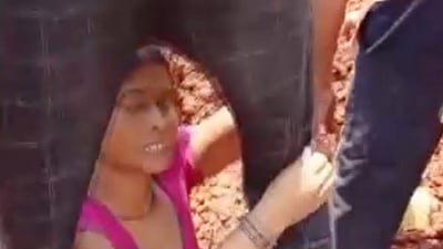 Two women being rescued after they were partially buried as murrum was tipped over them from a truck while they were protesting against road construction, in Madhya Pradesh�s Rewa district, in Rewa, Sunday, (PTI) Two women being rescued after they were partially buried as murrum was tipped over them from a truck while they were protesting against road construction, in Madhya Pradesh�s Rewa district, in Rewa, Sunday, (PTI)