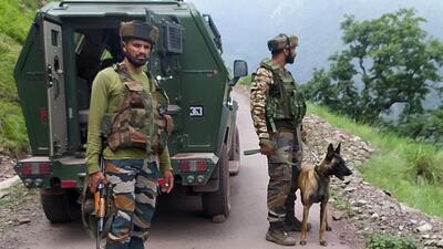 Security personnel stand guard during an anti-terrorist op after the attack on an army picket in Gundha, Rajouri. (ANI) Security personnel stand guard during an anti-terrorist op after the attack on an army picket in Gundha, Rajouri. (ANI)