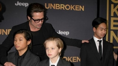 Brad Pitt with Pax (L), Shiloh (C) and Maddox (R) at the premiere of Jolie’s film, Unbroken. (Shutterstock) Brad Pitt with Pax (L), Shiloh (C) and Maddox (R) at the premiere of Jolie’s film, Unbroken. (Shutterstock)