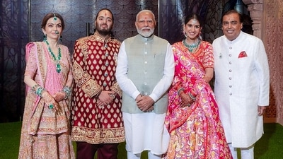 Prime Minister Narendra Modi poses for a photo with Anant Ambani and Radhika Merchant during their Shubh Aashirwad ceremony at Jio World Centre in Mumbai on Saturday. Reliance Foundation Founder and Chairperson Nita Ambani and her husband and Reliance Industries Chairman Mukesh Ambani also seen. (ANI) Prime Minister Narendra Modi poses for a photo with Anant Ambani and Radhika Merchant during their Shubh Aashirwad ceremony at Jio World Centre in Mumbai on Saturday. Reliance Foundation Founder and Chairperson Nita Ambani and her husband and Reliance Industries Chairman Mukesh Ambani also seen. (ANI)
