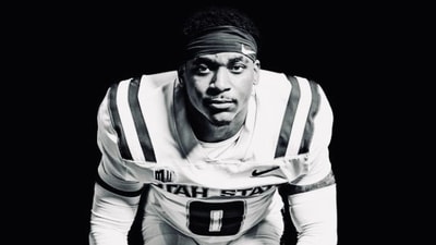 Andre Seldon Jr's portrait was shared by the Utah State University Football team on X/Twitter.