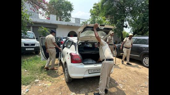 As part of their safety measures, police checking a vehicle at a check post before Nuh near Sohna in Gurugram on Monday. (HT Photo) As part of their safety measures, police checking a vehicle at a check post before Nuh near Sohna in Gurugram on Monday. (HT Photo)