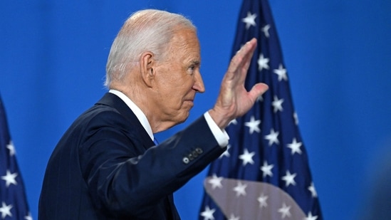 US president Joe Biden waves as he leaves after speaking during a press conference at the close of the 75th NATO Summit at the Walter E. Washington Convention Center in Washington, DC. (Photo by SAUL LOEB / AFP)