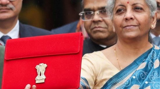 India's Finance Minister Nirmala Sitharaman holds up a folder with the Government of India's logo as she leaves her office to present the federal budget in the parliament, ahead of the nation's general election, in New Delhi, India, February 1, 2024. REUTERS/Anushree Fadnavis/File Photo/File Photo(REUTERS)