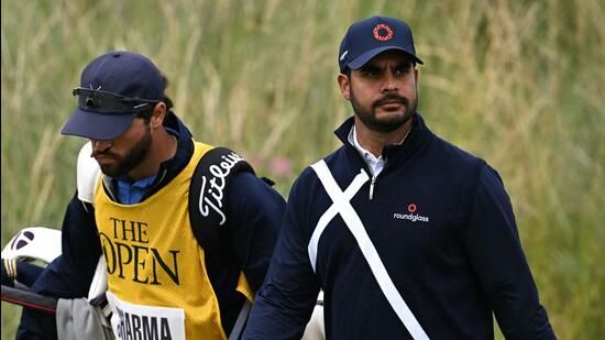 India's Shubhankar Sharma (R) and his caddie Lyle Phillips during the final round of the British Open Golf Championship. (AFP)