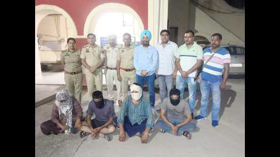 The accused in police custody in Ambala. The retired soldier, Bhushan Kumar, 45, also allegedly tried to burn the bodies after committing the crime, police said, adding the incident occurred at Rataur village in Naraingarh sub-division on Sunday night. (HT Photo)