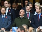 Britain's Prince Harry, Prince Philip and Prince William (L-R) attend the Rugby World Cup final match between New Zealand against Australia at Twickenham in London, Britain October 31, 2015. (REUTERS)