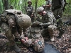 Ukrainian soldiers from the 3rd Spartan Task Force Brigade taking part in tactical and medical training exercises at an undisclosed location in Kharkiv region, Ukraine,(AP) Ukrainian soldiers from the 3rd Spartan Task Force Brigade taking part in tactical and medical training exercises at an undisclosed location in Kharkiv region, Ukraine,(AP)