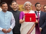 Finance minister Nirmala Sitharaman showcases a tablet wrapped in a red pouch carrying the Budget documents. Finance minister Nirmala Sitharaman showcases a tablet wrapped in a red pouch carrying the Budget documents.