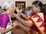 Union Minister of Finance and Corporate Affairs Nirmala Sitharaman called on President Droupadi Murmu at Rashtrapati Bhavan before presenting the Union Budget, in New Delhi. (PTI Photo)(PTI) Union Minister of Finance and Corporate Affairs Nirmala Sitharaman called on President Droupadi Murmu at Rashtrapati Bhavan before presenting the Union Budget, in New Delhi. (PTI Photo)(PTI)