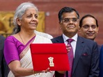 Union finance minister Nirmala Sitharaman along with finance secretary T V Somanathan outside the Finance Ministry in North Block before leaving for the Parliament where she will table the Union Budget 2024-25 in New Delhi, Tuesday, July 23, 2024. Union finance minister Nirmala Sitharaman along with finance secretary T V Somanathan outside the Finance Ministry in North Block before leaving for the Parliament where she will table the Union Budget 2024-25 in New Delhi, Tuesday, July 23, 2024.