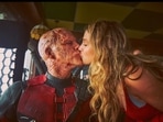 Blake Lively kisses Ryan Reynolds in his Deadpool prosthetic Blake Lively kisses Ryan Reynolds in his Deadpool prosthetic