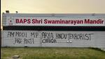 The graffiti spraypainted on the front portion of the BAPS Shri Swaminarayan Mandir in Edmonton, on Monday. The graffiti spraypainted on the front portion of the BAPS Shri Swaminarayan Mandir in Edmonton, on Monday.