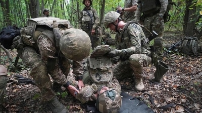 Ukrainian soldiers from the 3rd Spartan Task Force Brigade taking part in tactical and medical training exercises at an undisclosed location in Kharkiv region, Ukraine, (AP) Ukrainian soldiers from the 3rd Spartan Task Force Brigade taking part in tactical and medical training exercises at an undisclosed location in Kharkiv region, Ukraine, (AP)